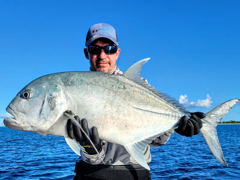 Rob with Giant Trevally Tap into some great Giant Trevally fishing at The Villages on Christmas Island.