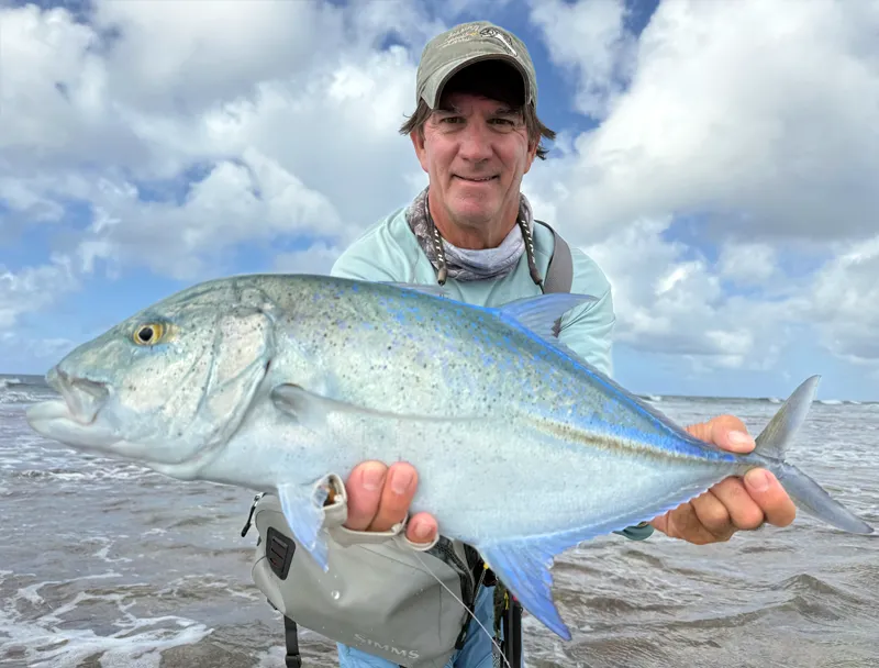 Brad Staples with Bluefin Trevally Brad Staples with bluefin trevally from Christmas Island The Villages.