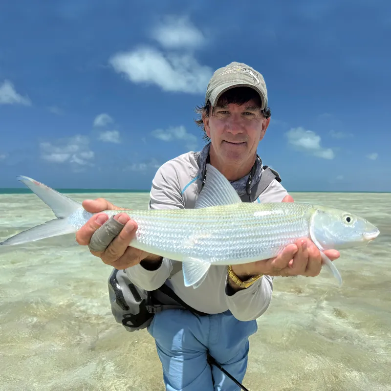 Brad Staples with Bonefish Brad Staples with a large bonefish at The Villages on Christmas Island.